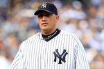 NEW YORK, NY - OCTOBER 02:  Freddy Garcia #36 of the New York Yankees walks off the field after the first inning of Game Two of the American League Division Series against the Detroit Tigers at Yankee Stadium on October 2, 2011 in New York City.  (Photo by Chris Trotman/Getty Images)