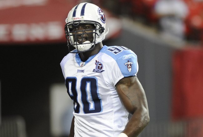 ATLANTA - AUGUST 22: Defensive end Jevon Kearse #90 of the  Tennessee Titans sets for play against the Atlanta Falcons at the Georgia Dome on August 22, 2008 in Atlanta, Georgia.  (Photo by Al Messerschmidt/Getty Images)