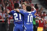 LISBON, PORTUGAL - MARCH 27:  Fernando Torres and Juan Mata of Chelsea congratulate scorer Salomon Kalou after his goal during the UEFA Champions League Quarter Final first leg match between Benfica and Chelsea at Estadio da Luz on March 27, 2012 in Lisbon, Portugal.  (Photo by Clive Rose/Getty Images)