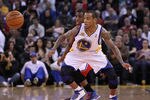 OAKLAND, CA - FEBRUARY 20:  Monta Ellis #8 of the Golden State Warariors and Chris Paul #3 of the Los Angeles Clippers go for a loose ball at Oracle Arena on February 20, 2012 in Oakland, California.  NOTE TO USER: User expressly acknowledges and agrees that, by downloading and or using this photograph, User is consenting to the terms and conditions of the Getty Images License Agreement.  (Photo by Ezra Shaw/Getty Images)