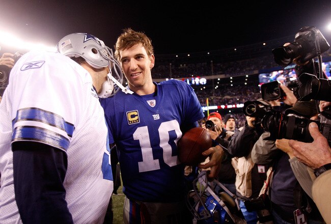 EAST RUTHERFORD, NJ - JANUARY 01:  Tony Romo #9 of the Dallas Cowboys and  Eli Manning #10 of the New York Giants greet each other after their game at MetLife Stadium on January 1, 2012 in East Rutherford, New Jersey.  (Photo by Rich Schultz/Getty Images)