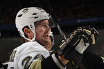 NEWARK, NJ - MARCH 17: Matt Cooke #24 of the Pittsburgh Penguins celebrates his second goal of the game against the New Jersey Devils at the Prudential Center on March 17, 2012 in Newark, New Jersey. The Penguins defeated the Devils 5-2. (Photo by Bruce Bennett/Getty Images)