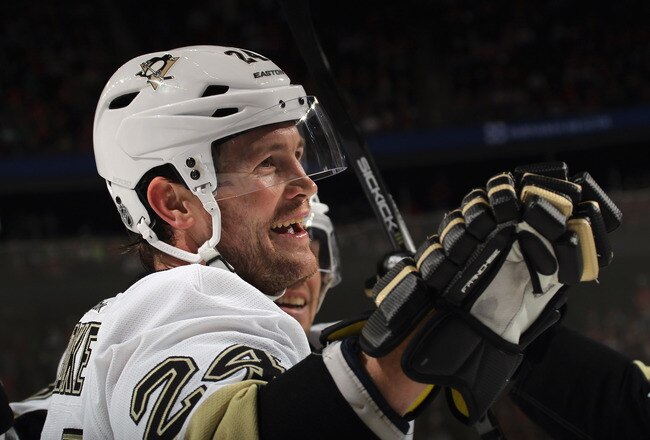 NEWARK, NJ - MARCH 17: Matt Cooke #24 of the Pittsburgh Penguins celebrates his second goal of the game against the New Jersey Devils at the Prudential Center on March 17, 2012 in Newark, New Jersey. The Penguins defeated the Devils 5-2. (Photo by Bruce Bennett/Getty Images)