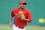 CLEARWATER, FL - FEBRUARY 24:  Infielder Freddy Galvis #71 of the Philadelphia Phillies runs to the dugout during play against the Florida State Seminoles February 24, 2011 at Bright House Field in Clearwater, Florida.  (Photo by Al Messerschmidt/Getty Images)