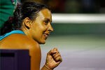 KEY BISCAYNE, FL - MARCH 28:  Marion Bartoli of France reacts to winning a match against Victoria Azarenka of Belaraus during Day 10 of the Sony Ericcson Open at Crandon Park Tennis Center on March 28, 2012 in Key Biscayne, Florida.  (Photo by Mike Ehrmann/Getty Images)