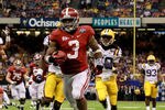 NEW ORLEANS, LA - JANUARY 09:  Trent Richardson #3 of the Alabama Crimson Tide runs for a 34 yard touchdown in the fourth quarter against Morris Claiborne #17 of the Louisiana State University Tigers during the 2012 Allstate BCS National Championship Game at Mercedes-Benz Superdome on January 9, 2012 in New Orleans, Louisiana.  (Photo by Ronald Martinez/Getty Images)