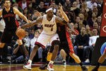 MIAMI, FL - JANUARY 22:  LeBron James #6 of the Miami Heat posts up Jose Calderon #8 of the Toronto Raptors during a game  at American Airlines Arena on January 22, 2011 in Miami, Florida. NOTE TO USER: User expressly acknowledges and agrees that, by downloading and/or using this Photograph, User is consenting to the terms and conditions of the Getty Images License Agreement.  (Photo by Mike Ehrmann/Getty Images)
