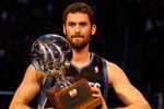 ORLANDO, FL - FEBRUARY 25:  Kevin Love of the Minnesota Timberwolves celebrates with the trophy after he won the Foot Locker Three-Point Contest part of 2012 NBA All-Star Weekend at Amway Center on February 25, 2012 in Orlando, Florida.  NOTE TO USER: User expressly acknowledges and agrees that, by downloading and or using this photograph, User is consenting to the terms and conditions of the Getty Images License Agreement.  (Photo by Mike Ehrmann/Getty Images)