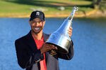 ORLANDO, FL - MARCH 25:  Tiger Woods of the USA proudly holds the trophy during the final round of the 2012 Arnold Palmer Invitational presented by MasterCard at Bay Hill Club and Lodge on March 25, 2012 in Orlando, Florida.  (Photo by David Cannon/Getty Images)