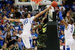 ATLANTA, GA - MARCH 25:  Pierre Jackson #55 of the Baylor Bears has his shot blocked by Anthony Davis #23 of the Kentucky Wildcats during the 2012 NCAA Men's Basketball South Regional Final at the Georgia Dome on March 25, 2012 in Atlanta, Georgia.  (Photo by Kevin C. Cox/Getty Images)