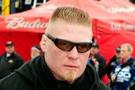 DAYTONA BEACH, FL - FEBRUARY 13:  MMA fighter Brock Lesnar walks in the garage area during practice for the Daytona 500 at Daytona International Speedway on February 13, 2010 in Daytona Beach, Florida.  (Photo by Sam Greenwood/Getty Images for NASCAR)