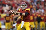 LOS ANGELES, CA - NOVEMBER 12:  Quarterback Matt Barkley #7 of the USC Trojans throws a pass against the Washington Huskies at the Los Angeles Memorial Coliseum on November 12, 2011 in Los Angeles, California.  USC won 40-17.  (Photo by Stephen Dunn/Getty Images)