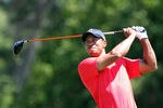 ORLANDO, FL - MARCH 25:  Tiger Woods plays a shot on the 4th hole during the final round of the Arnold Palmer Invitational presented by MasterCard at the Bay Hill Club and Lodge on March 25, 2012 in Orlando, Florida.  (Photo by Sam Greenwood/Getty Images)