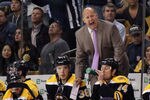 BOSTON, MA - OCTOBER 18:  Head coach Claude Julien of the Boston Bruins tries to get the attention of one of the officials in the second period against the Carolina Hurricanes on October 18, 2011 at TD Garden in Boston, Massachusetts.  (Photo by Elsa/Getty Images)