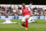 LONDON, ENGLAND - MARCH 31:  Theo Walcott of Arsenal celebrates scoring his side's equalising goal during the Barclays Premier League match between Queens Park Rangers and Arsenal at Loftus Road on March 31, 2012 in London, England.  (Photo by Ian Walton/Getty Images)