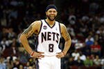 NEWARK, NJ - MARCH 19:  Deron Williams #8 of the New Jersey Nets laughs on court against the Cleveland Cavaliers at Prudential Center on March 19, 2012 in Newark, New Jersey.  NOTE TO USER: User expressly acknowledges and agrees that, by downloading and or using this photograph, User is consenting to the terms and conditions of the Getty Images License Agreement.  (Photo by Chris Chambers/Getty Images)