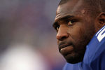 EAST RUTHERFORD, NJ - JANUARY 08:  Brandon Jacobs #27 of the New York Giants looks on against the Atlanta Falcons during their NFC Wild Card Playoff game at MetLife Stadium on January 8, 2012 in East Rutherford, New Jersey.  (Photo by Nick Laham/Getty Images)
