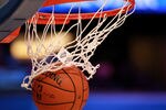 ORLANDO, FL - FEBRUARY 26:  A detail of an official Spalding basketball going through the net with an offical logo of the 2012 Orlando NBA All-Star Game during the 2012 NBA All-Star Game at the Amway Center on February 26, 2012 in Orlando, Florida.  NOTE TO USER: User expressly acknowledges and agrees that, by downloading and or using this photograph, User is consenting to the terms and conditions of the Getty Images License Agreement.  (Photo by Ronald Martinez/Getty Images)
