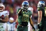 PASADENA, CA - JANUARY 02:  Running back LaMichael James #21 of the Oregon Ducks reacts in the second half against the Wisconsin Badgers at the 98th Rose Bowl Game on January 2, 2012 in Pasadena, California.  (Photo by Harry How/Getty Images)