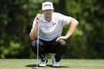 HUMBLE, TX - APRIL 01:  Hunter Mahan lines up his birdie putt on the second hole during the final round of the Shell Houston Open at Redstone Golf Club on April 1, 2012 in Humble, Texas.  (Photo by Matt Sullivan/Getty Images)
