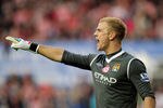 STOKE ON TRENT, ENGLAND - MARCH 24:  Goalkeeper Joe Hart of Manchester City directs his defence during the Barclays Premier League match between Stoke City and Manchester City at the Britannia Stadium on March 24, 2012 in Stoke on Trent, England.  (Photo by Shaun Botterill/Getty Images)