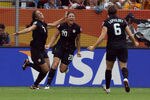 DRESDEN, GERMANY - JULY 10: Shannon Boxx (L) of USA celebrate their team opening goal during the FIFA Women's World Cup 2011 Quarter Final match between Brazil and USA at Rudolf-Harbig-Stadion on July 10, 2011 in Dresden, Germany. (Photo by Martin Rose/Getty Images)