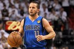 MIAMI, FL - JUNE 12:  Jose Juan Barea #11 of the Dallas Mavericks brings the ball up court against the Miami Heat in Game Six of the 2011 NBA Finals at American Airlines Arena on June 12, 2011 in Miami, Florida. The Mavericks won 105-95. NOTE TO USER: User expressly acknowledges and agrees that, by downloading and/or using this Photograph, user is consenting to the terms and conditions of the Getty Images License Agreement.  (Photo by Ronald Martinez/Getty Images)