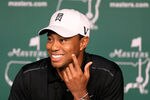 AUGUSTA, GA - APRIL 03:  Tiger Woods speaks to the media during a practice round prior to the start of the 2012 Masters Tournament at Augusta National Golf Club on April 3, 2012 in Augusta, Georgia.  (Photo by David Cannon/Getty Images)
