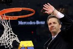 NEW ORLEANS, LA - APRIL 02:  Head coach John Calipari celebrates as he cuts down the net after the Wildcats defeat the Kansas Jayhawks 67-59 in the National Championship Game of the 2012 NCAA Division I Men's Basketball Tournament at the Mercedes-Benz Superdome on April 2, 2012 in New Orleans, Louisiana.  (Photo by Ronald Martinez/Getty Images)