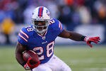 ORCHARD PARK, NY - DECEMBER 24:  C.J. Spiller #28 of the Buffalo Bills runs against the Denver Broncos at Ralph Wilson Stadium on December 24, 2011 in Orchard Park, New York. Spiller had his first 100 yard rushing game in the NFL. Buffalo won 40-14.  (Photo by Rick Stewart/Getty Images)