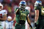 PASADENA, CA - JANUARY 02:  Running back LaMichael James #21 of the Oregon Ducks reacts in the second half against the Wisconsin Badgers at the 98th Rose Bowl Game on January 2, 2012 in Pasadena, California.  (Photo by Harry How/Getty Images)