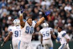 OAKLAND, CA - DECEMBER 18:  Ndamukong Suh #90 of the Detroit Lions celebrates after they came from behind to beat the Oakland Raiders at O.co Coliseum on December 18, 2011 in Oakland, California.  (Photo by Ezra Shaw/Getty Images)