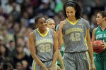 DENVER, CO - APRIL 03:  (L-R) Brooklyn Pope #32 and Brittney Griner #42 of the Baylor Bears react on court in the second half against the Notre Dame Fighting Irish during the National Final game of the 2012 NCAA Division I Women's Basketball Championship at Pepsi Center on April 3, 2012 in Denver, Colorado.  (Photo by Justin Edmonds/Getty Images)