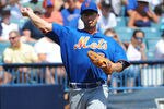 TAMPA, FL - APRIL 4: Infielder David Wright #5 of the New York Mets throws to first base against the New York Yankees in a spring training game April 4, 2012  at George M. Steinbrenner Field in Tampa, Florida.  (Photo by Al Messerschmidt/Getty Images)