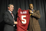ASHURN, VA - APRIL 6:  Mike Shanahan, head coach of the Washington Redskins presents Donovan McNabb with his new jersey during a press conference on April 6, 2010 at Redskin Park in Ashburn, Virginia.  (Photo by Mitchell Layton/Getty Images)