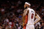 MIAMI, FL - FEBRUARY 21:  LeBron James #6 of the Miami Heat looks on during a game against the Sacramento Kings at American Airlines Arena on February 21, 2012 in Miami, Florida. NOTE TO USER: User expressly acknowledges and agrees that, by downloading and/or using this Photograph, User is consenting to the terms and conditions of the Getty Images License Agreement.  (Photo by Mike Ehrmann/Getty Images)