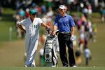 AUGUSTA, GA - APRIL 07:  Lee Westwood of England (R) waits on the first fairway alongside caddie Billy Foster (L) during the third round of the 2012 Masters Tournament at Augusta National Golf Club on April 7, 2012 in Augusta, Georgia.  (Photo by Streeter Lecka/Getty Images)