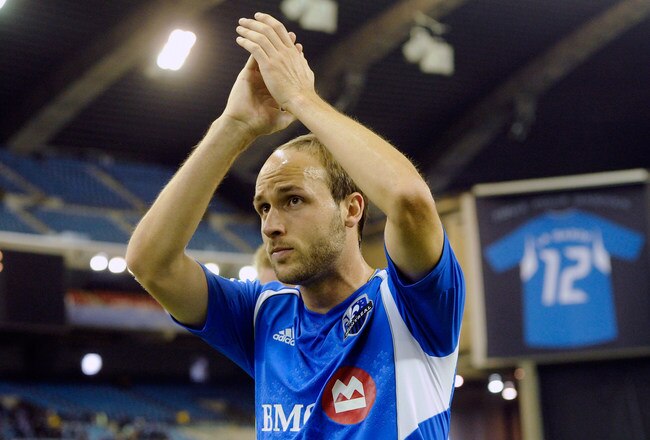 MONTREAL, CANADA - APRIL 7:  Justin Mapp #21 of the Montreal Impact celebrates after defeating the Toronto FC during the MLS match at the Olympic Stadium on April 7, 2012 in Montreal, Quebec, Canada.  The Impact defeated the Toronto FC 2-1.  (Photo by Richard Wolowicz/Getty Images)