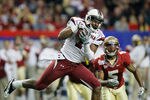 ATLANTA, GA - DECEMBER 31:  Alshon Jeffery #1 of the South Carolina Gamecocks pulls in this reception against Greg Reid #5 of the Florida State Seminoles during the 2010 Chick-fil-A Bowl at Georgia Dome on December 31, 2010 in Atlanta, Georgia.  (Photo by Kevin C. Cox/Getty Images)