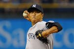 ST. PETERSBURG, FL - APRIL 7: Pitcher Hiroki Kuroda #18 of the New York Yankees starts against the Tampa Bay Rays April 7, 2012  at Tropicana Field in St. Petersburg, Florida.  (Photo by Al Messerschmidt/Getty Images)