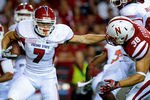 LINCOLN, NE - SEPTEMBER 10: Devon Wylie #7 of the Fresno State Bulldogs tries to hold off Graham Stoddard #38 of the Nebraska Cornhuskers during their game at Memorial Stadium September 10, 2011 in Lincoln, Nebraska. Nebraska won 42-29.(Photo by Eric Francis/Getty Images)