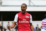 LONDON, ENGLAND - MARCH 31:  Theo Walcott of Arsenal celebrates scoring his side's equalising goal during the Barclays Premier League match between Queens Park Rangers and Arsenal at Loftus Road on March 31, 2012 in London, England.  (Photo by Ian Walton/Getty Images)