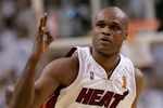 MIAMI - JUNE 15:  Antoine Walker #8 of the Miami Heat celebrates a three-point basket in the fourth quarter against the Dallas Mavericks in game four of the 2006 NBA Finals on June 15, 2006 at American Airlines Arena in Miami, Florida.  NOTE TO USER: User expressly acknowledges and agrees that, by downloading and or using this photograph, User is consenting to the terms and conditions of the Getty Images License Agreement.  (Photo by Ronald Martinez/Getty Images)