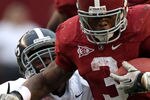 TUSCALOOSA, AL - NOVEMBER 19:  Running back Trent Richardson #3 of the Alabama Crimson Tide runs with the ball during the game against the Georgia Southern Eagles at Bryant-Denny Stadium on November 19, 2011 in Tuscaloosa, Alabama.  (Photo by Mike Zarrilli/Getty Images)