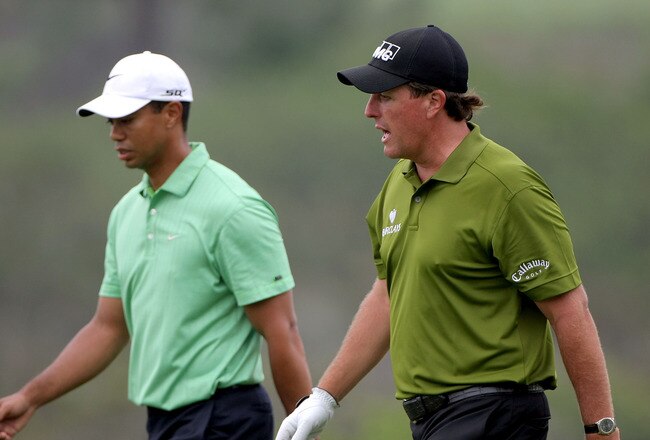 SAN DIEGO - JUNE 13:  Tiger Woods walks past Phil Mickelson on the sixth fairway during the second round of the 108th U.S. Open at the Torrey Pines Golf Course (South Course) on June 13, 2008 in San Diego, California.  (Photo by Doug Pensinger/Getty Images)