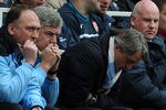 LONDON, ENGLAND - APRIL 08:  Man City manager Roberto Mancini reacts during the Barclays Premier League match between Arsenal and Manchester City at Emirates Stadium on April 8, 2012 in London, England.  (Photo by Michael Regan/Getty Images)