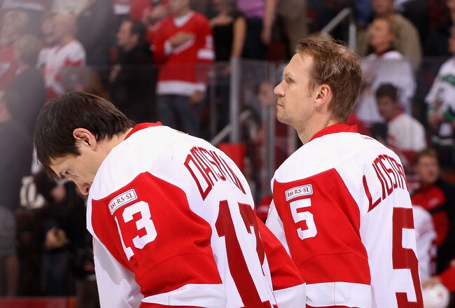 GLENDALE, AZ - JANUARY 19:  Pavel Datsyuk #13 and Nicklas Lidstrom #5 of the Detroit Red Wings stand attended for the National Anthem before the NHL game against the Phoenix Coyotes at Jobing.com Arena on January 19, 2011 in Glendale, Arizona. The Red Wings defeated the Coyotes 3-2 in an overtime shoot out.  (Photo by Christian Petersen/Getty Images)