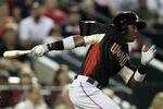 PHOENIX, AZ - JULY 10:  World Future's All-Star Jurickson Profar #10 of the Texas Rangers triples in the sixth inning during the 2011 XM All-Star Futures Game at Chase Field on July 10, 2011 in Phoenix, Arizona.  (Photo by Christian Petersen/Getty Images)