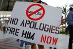 MIAMI, FL - APRIL 10:  Protesters rally outside a press conference held by Miami Marlins Manager Ozzie Guillen for comments made about Fidel Castro at Marlins Park on April 10, 2012 in Miami, Florida. The Marlins suspended Guillen for five games over his pro-Castro comments.  (Photo by Mike Ehrmann/Getty Images)