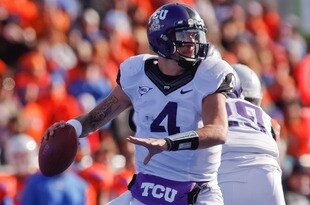 BOISE, ID - NOVEMBER 12:  Casey Pachall #4 of the TCU Horned Frogs looks for a receiver against the Boise State Broncos at Bronco Stadium on November 12, 2011 in Boise, Idaho.  (Photo by Otto Kitsinger III/Getty Images)